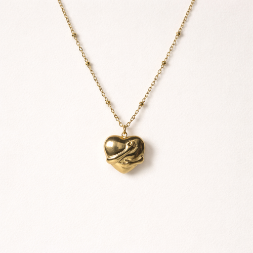 Golden Hug Heart Pendant Necklace – Symbol of Love & Care