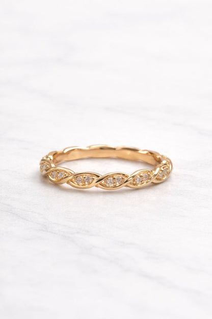 Elegant Wave Design Gold Ring with Crystal Accents